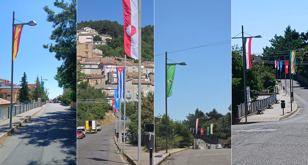 Le bandiere del mondo sventolano su Via Sandro Pertini Bocchigliero si racconta come paese del Sud aperto al mondo